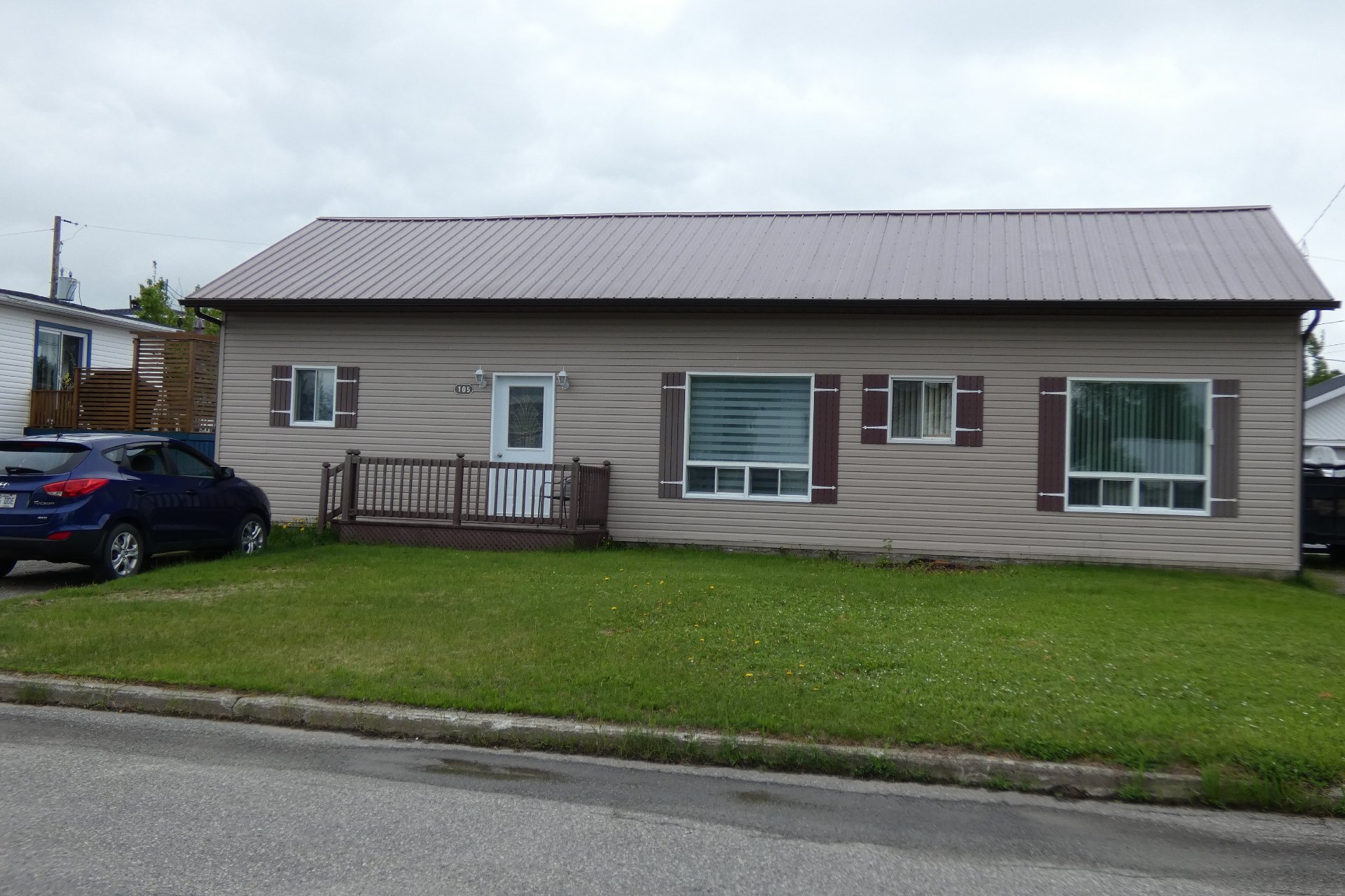 Propriétés 105 Place Cent La Sarre Les immeubles EXCELL