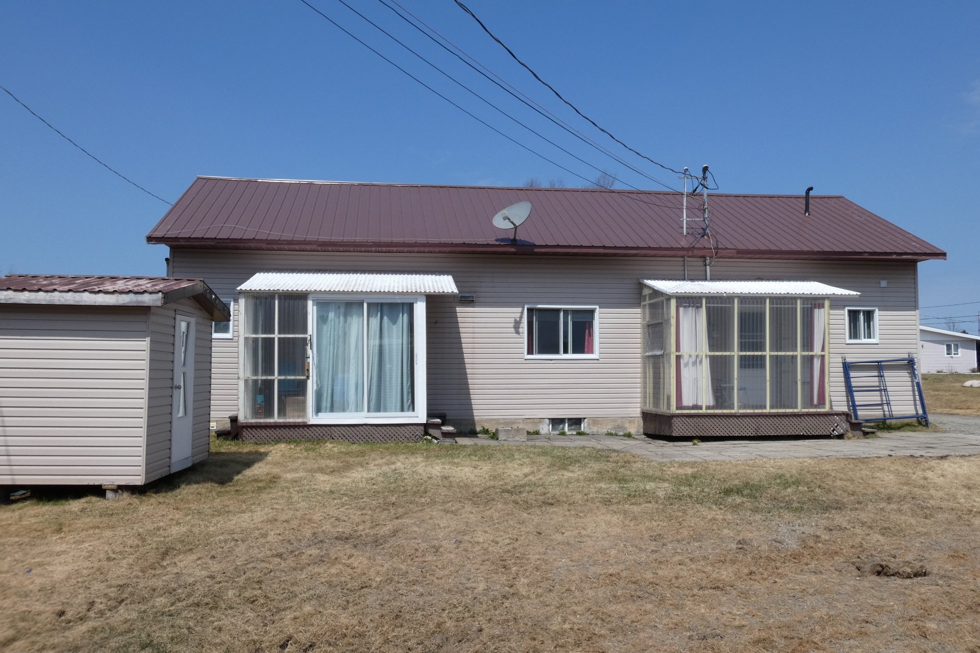 Propriétés 105 Place Cent La Sarre Les immeubles EXCELL